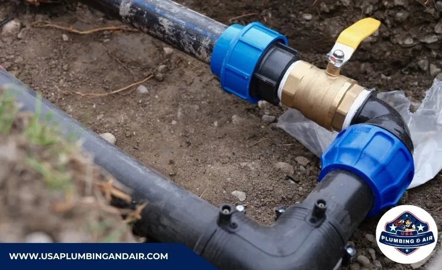 USA Plumbing & Air technician fixing a damaged water meter connection in Las Vegas